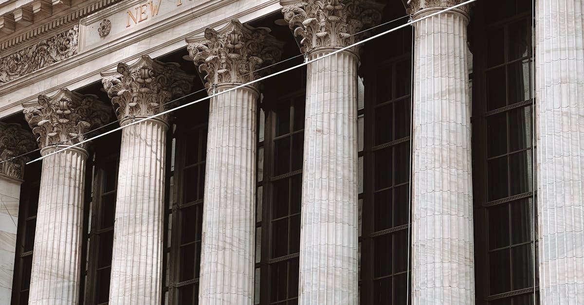 Facade of the New York Stock Exchange with American flags
