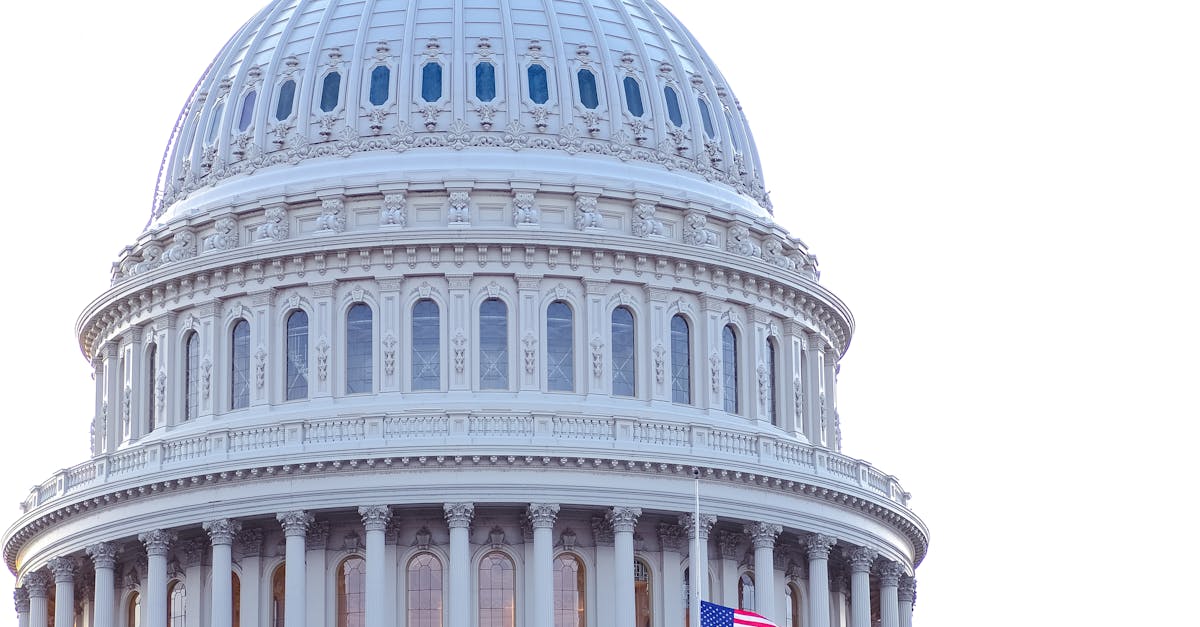 The United States Capitol dome with American flag.