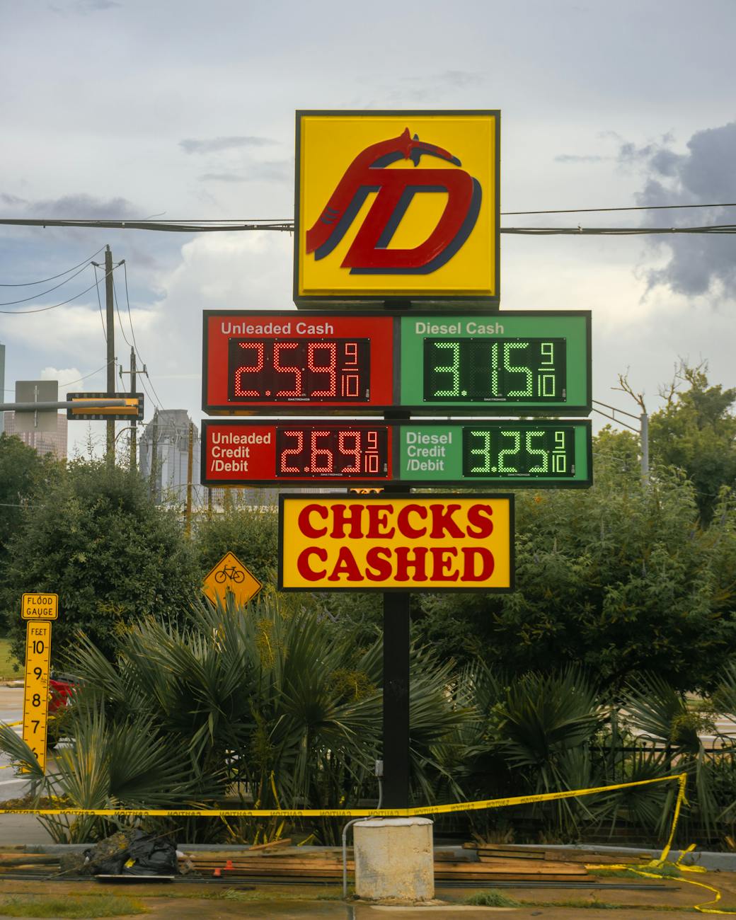 Gas station signboard with regular and premium fuel prices in Houston, Texas