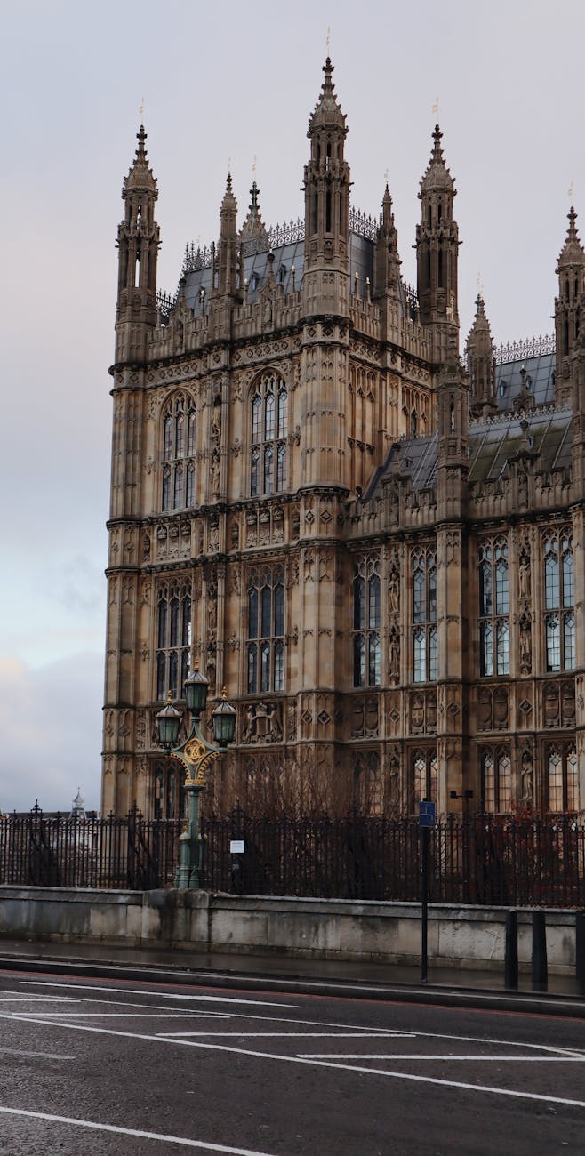 Palace of Westminster in London under a grey sky