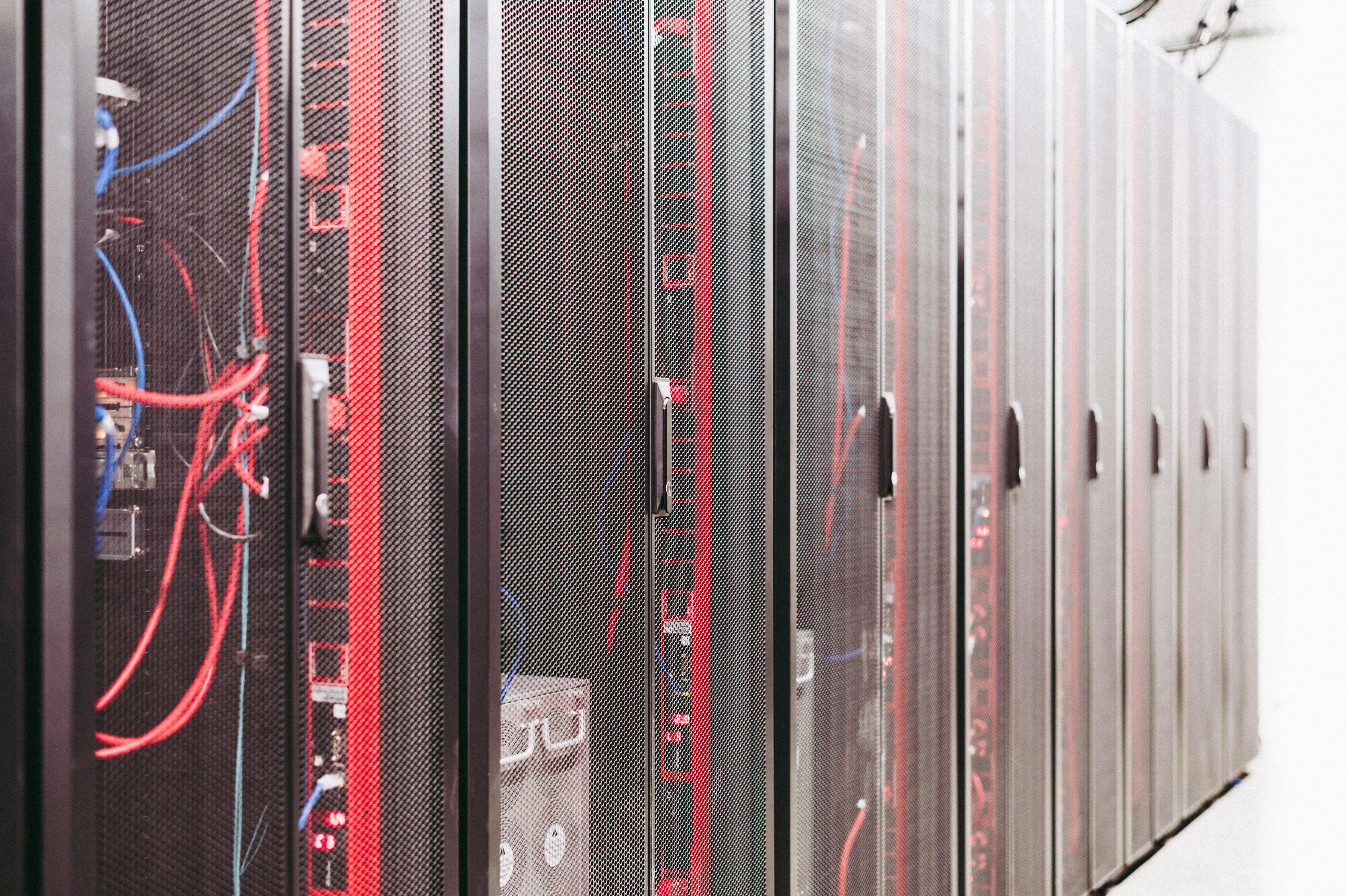 Server racks with network cables in a modern data centre