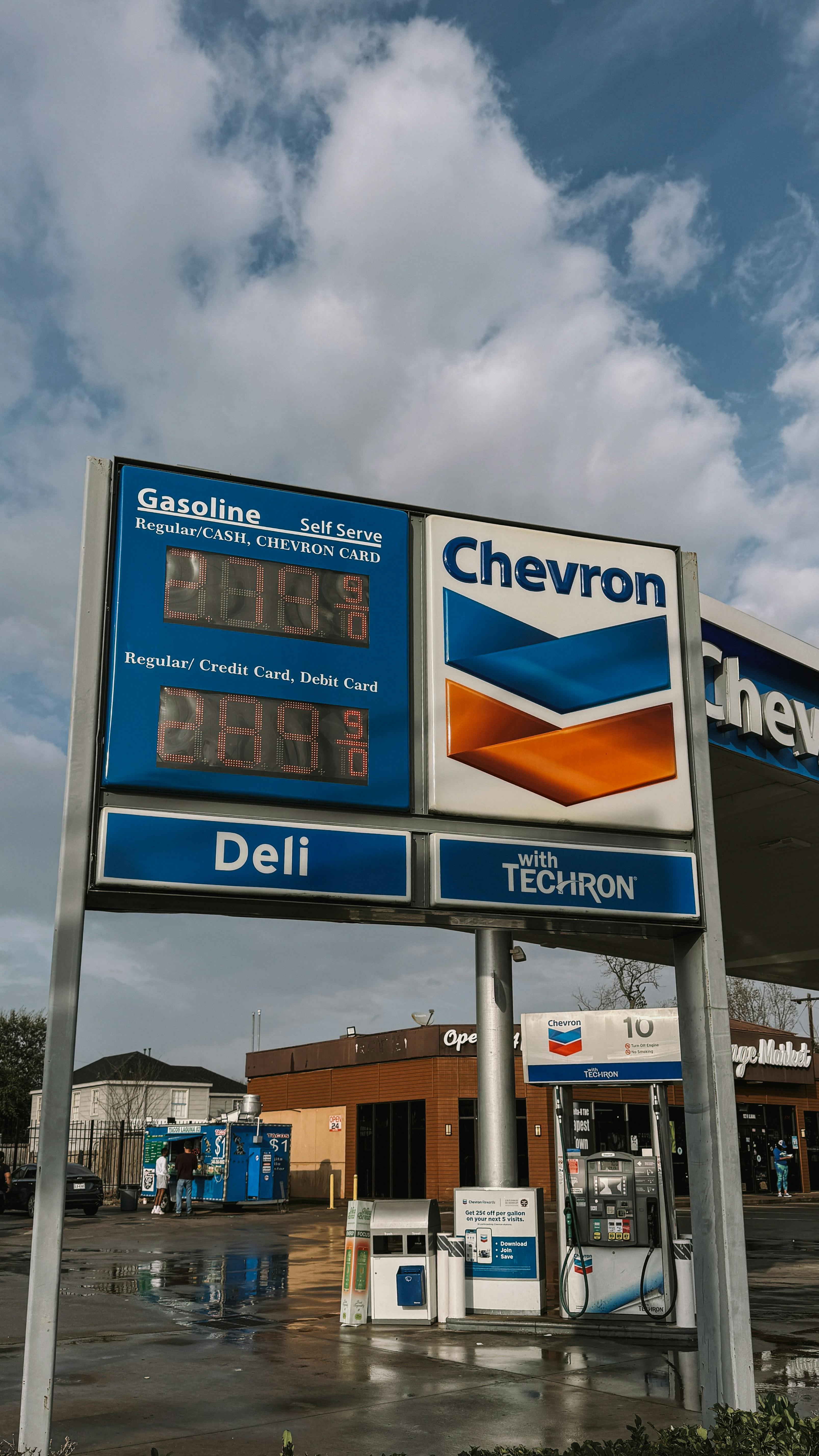 Chevron gas station in Houston, Texas with clear blue skies and price display