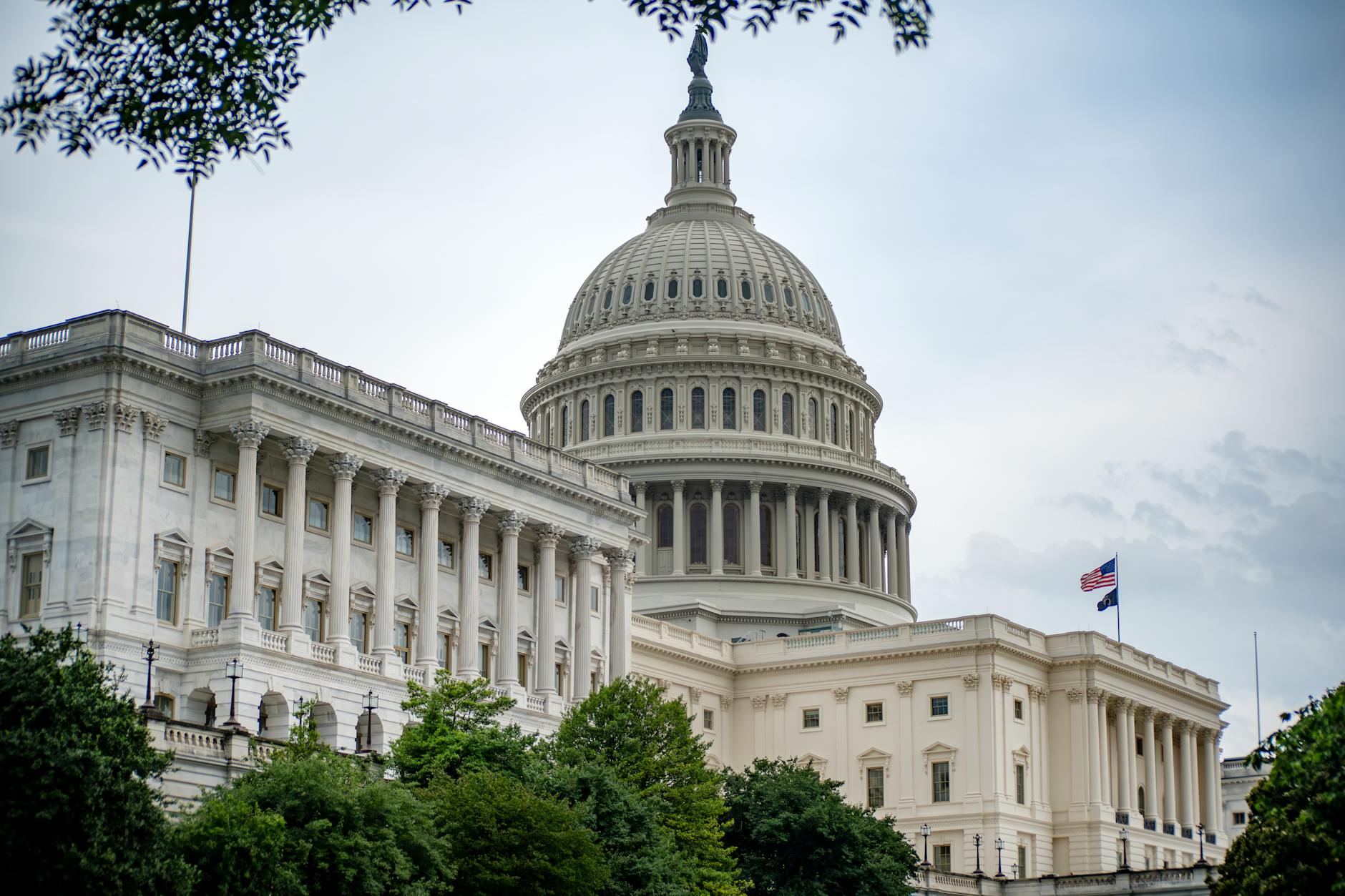 The US Capitol Building in Washington DC under a dramatic sky, seat of the United States Congress