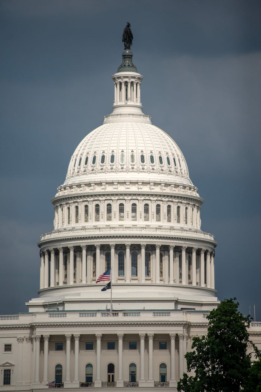The US Capitol dome against a cloudy sky