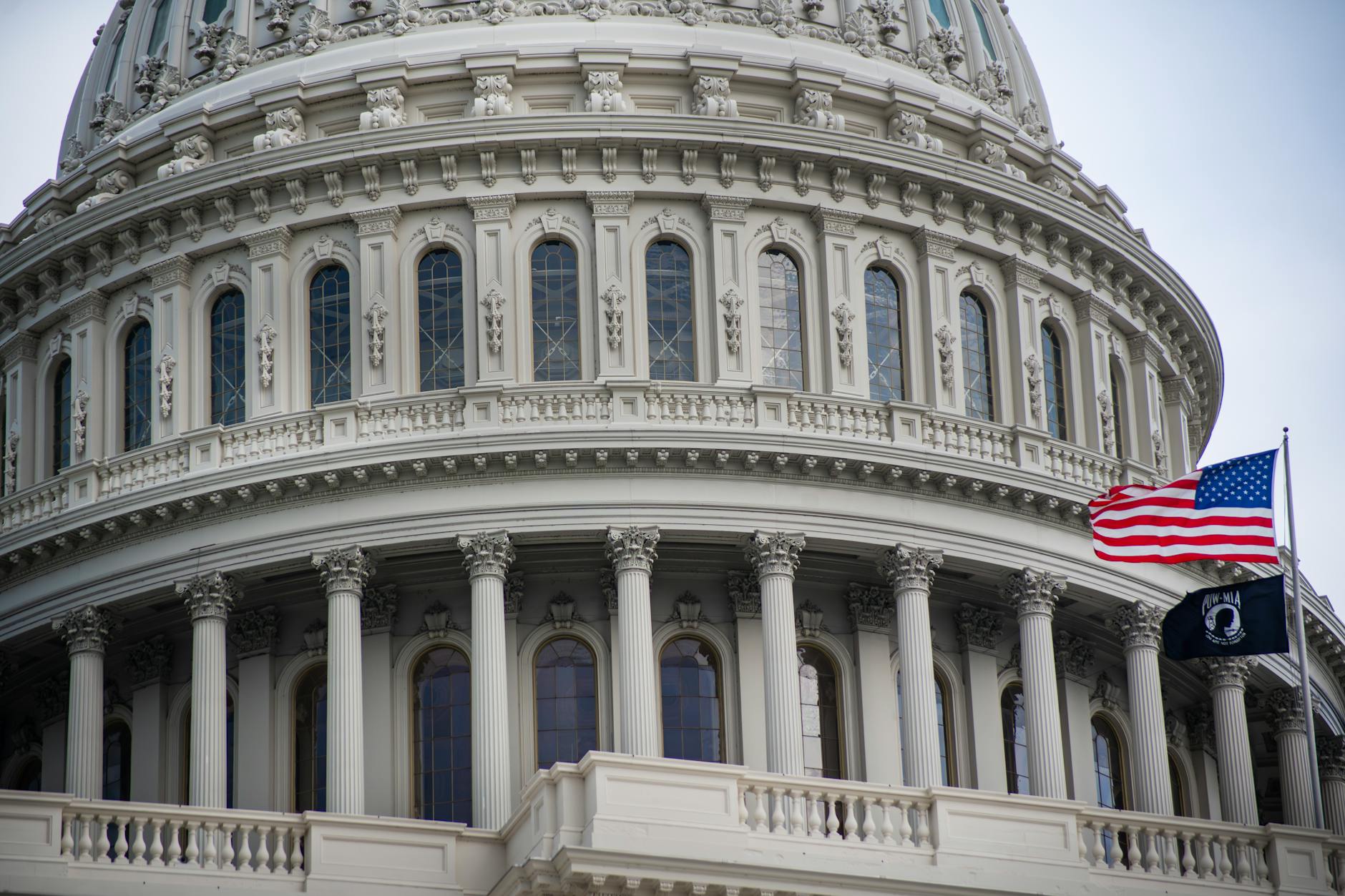 US Capitol dome with American flag in Washington
