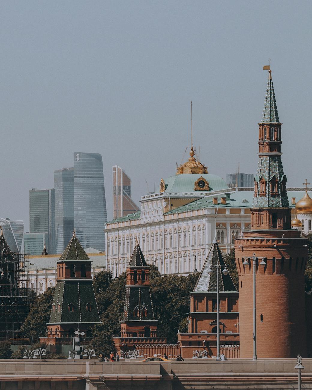 View of the Moscow Kremlin with modern skyscrapers in the background.