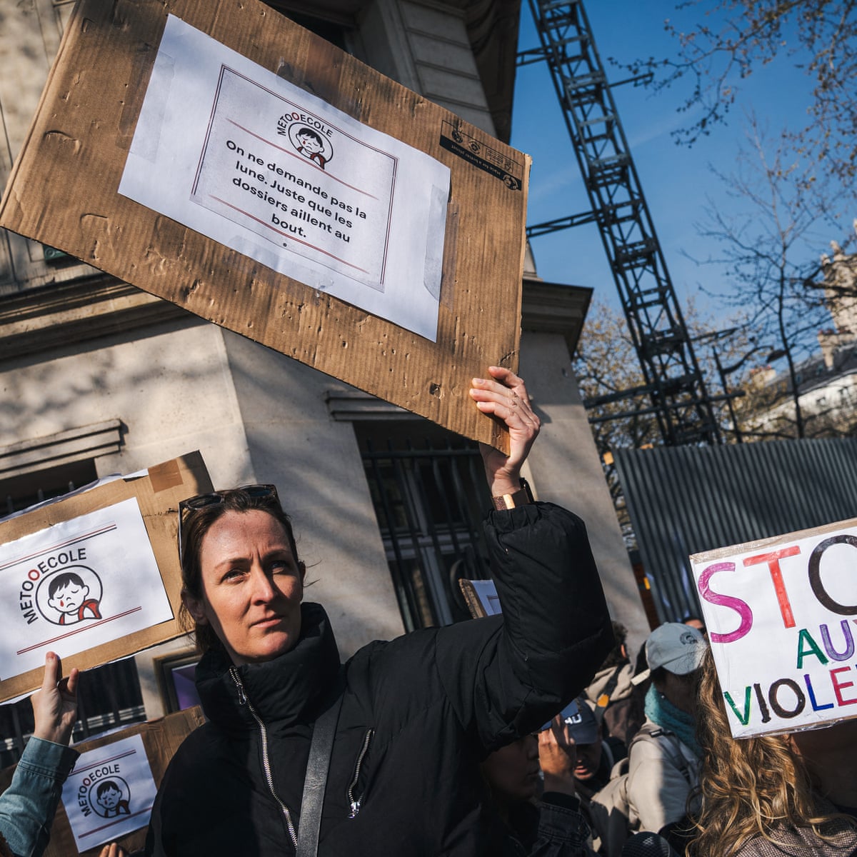 Mothers protest outside Paris city hall against child sexual abuse by school staff.
