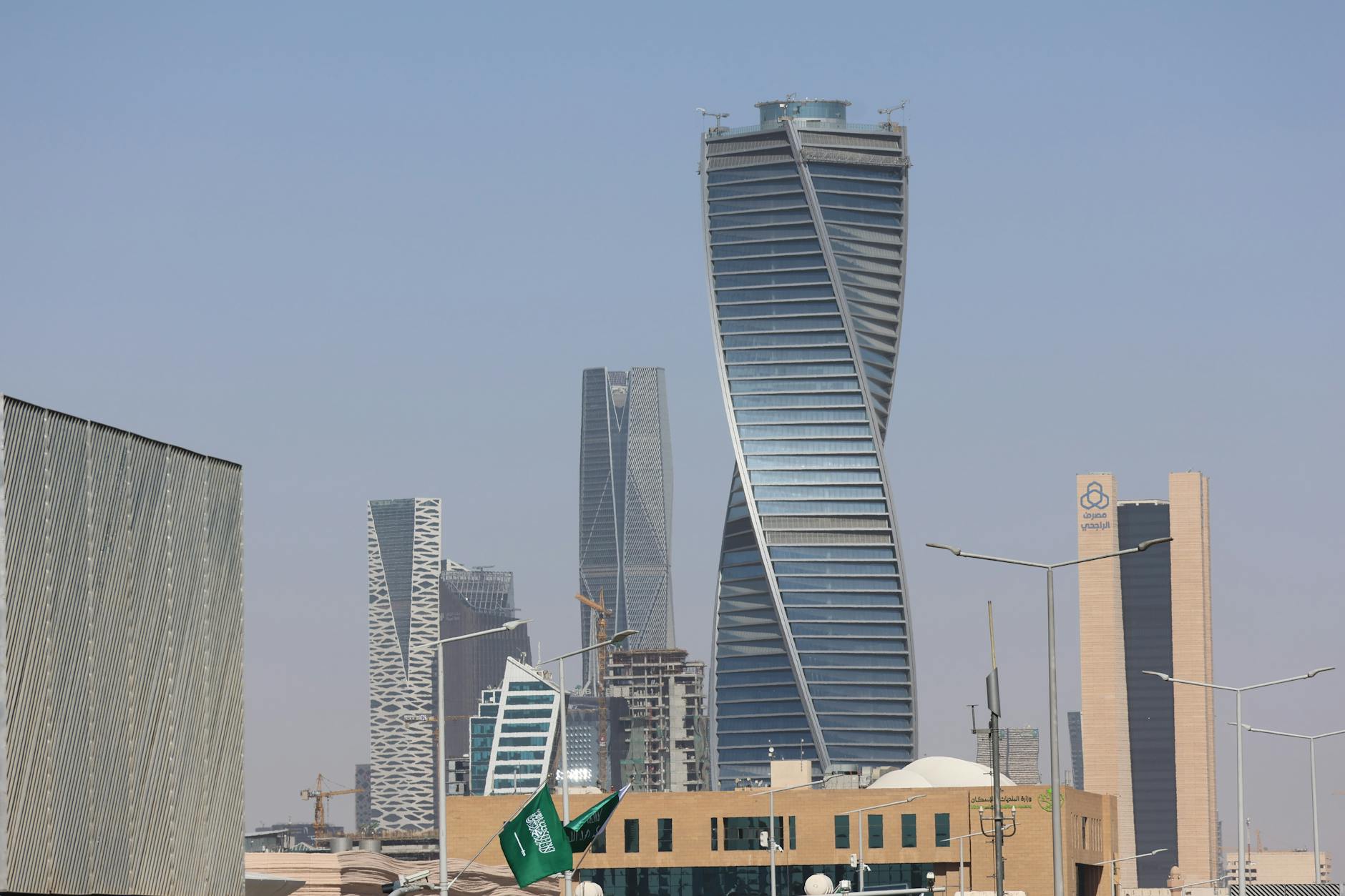 Riyadh skyline under haze as Saudi Arabia reins in spending plans
