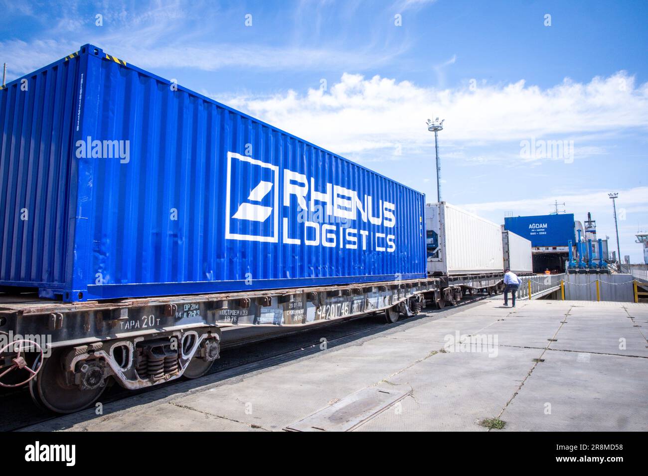 Freight cars with containers are loaded at Kazakhstan's port of Kuryk on the Caspian Sea for Middle Corridor transport between Asia and Europe.