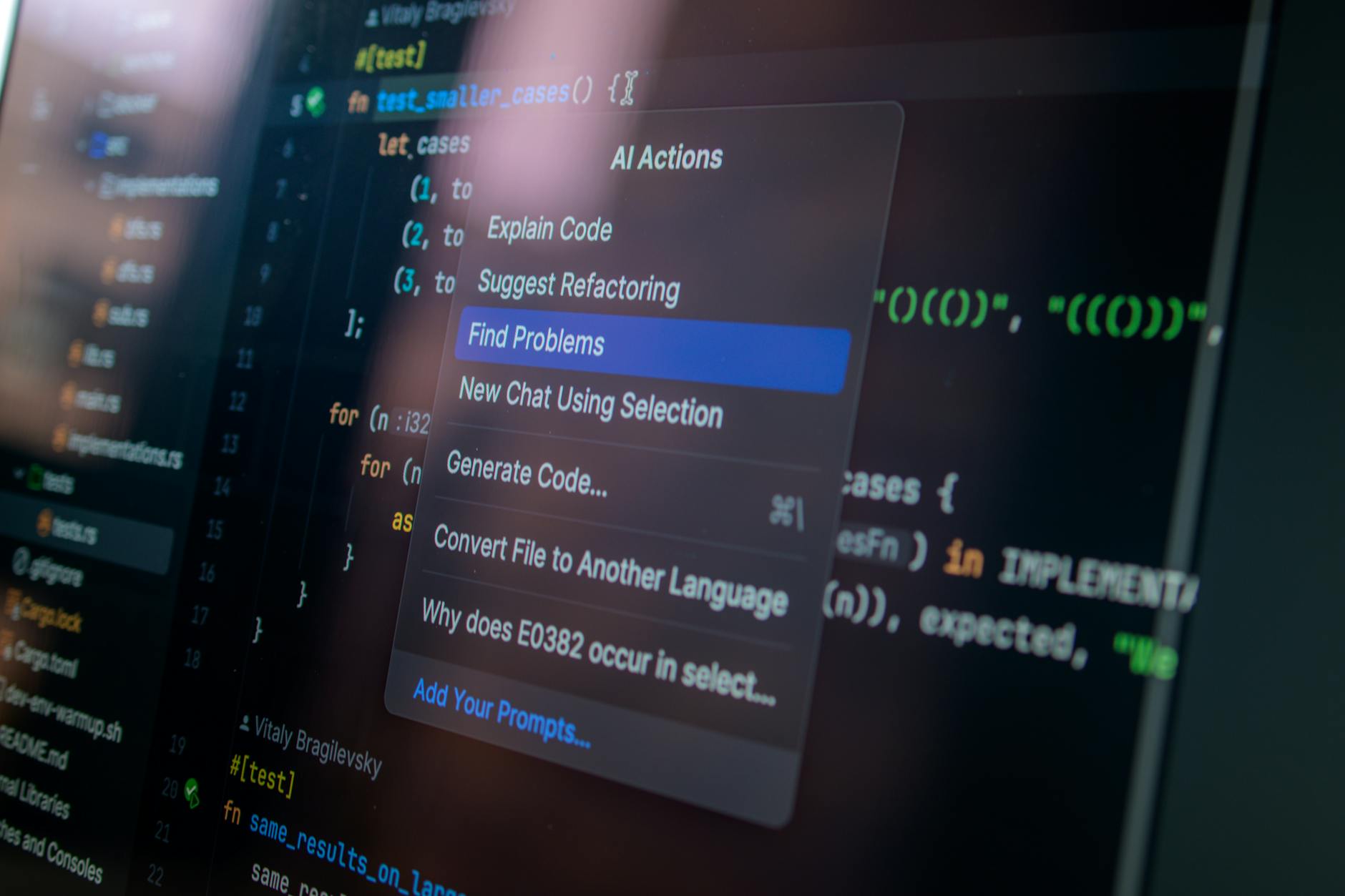 Computer screen showing code and AI action options for software development
